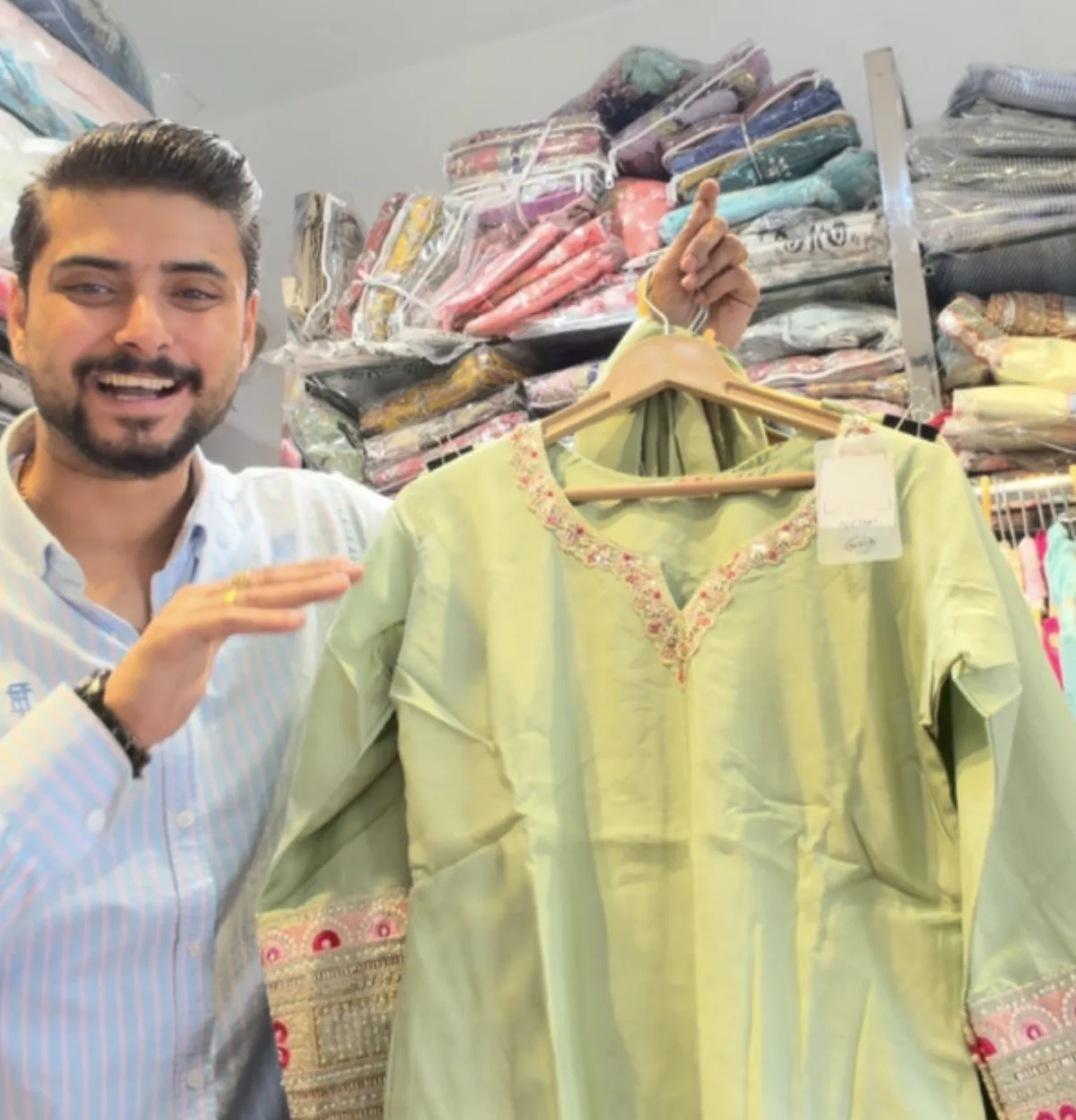 Sage green kurta with a pearl-worked neckline